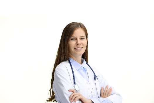 A female doctor, close-up, on a white background, crossed her arms.