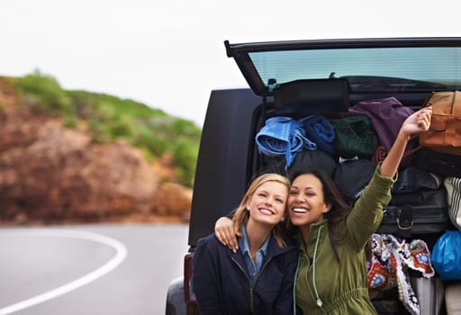 Women, friends and car trunk or road trip or excited in nature or camping holiday, vacation or explore. Female person, smile and boot with bag luggage or European adventure, transportation or journey.