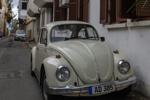 Lefkosa Cyprus 16.02.2024 - old ivory car on the street of the old town 1