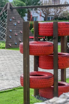 children's playground made from car tires, tire recycling