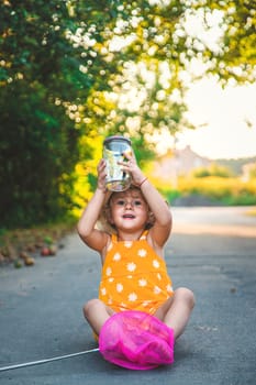 A child catches a butterfly in nature. selective focus. kid.