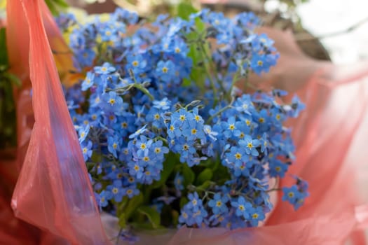 Bright blue flowers in a bouquet close up