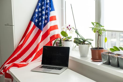 usa flag and video by laptop, videoconference. High quality photo