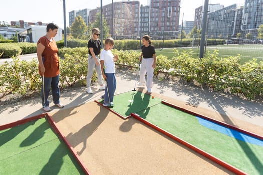 A playground in the park equipped for playing mini-golf. High quality photo
