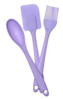 Silicone brush and spoon for food on isolated background, set
