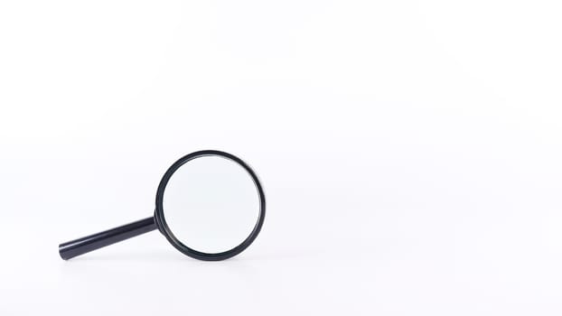 Black magnifying glass with handle on white background. Society questions, looking for answers