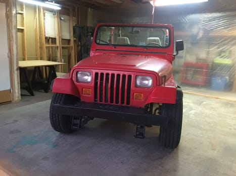 Auto Body Repair and Repainting Prep Work on Red Vehicle. High quality photo