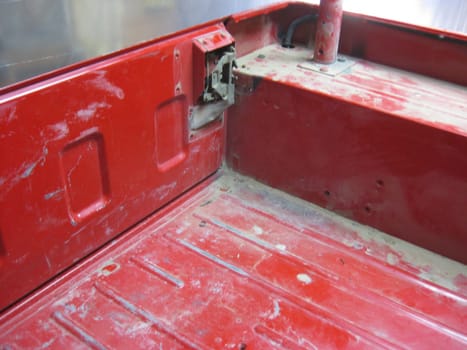 Auto Body Repair and Repainting Prep Work on Red Vehicle. High quality photo