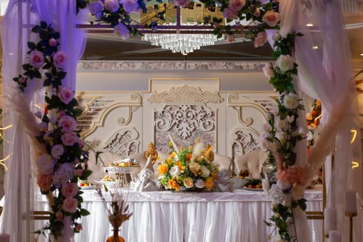 festive wedding table for newlyweds with decor.