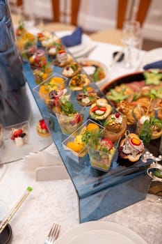 top view of snacks on a buffet table in an elite hotel.