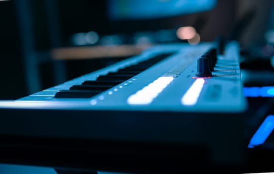 electric piano with keys close-up with bokeh.