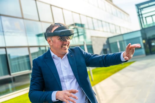 Businessman enjoying using augmented vision glasses outside the office financial building