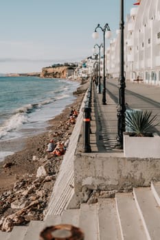 coastal area with apartment buildings of residential areas, modern hotel and restaurant complex on water and sandy beaches