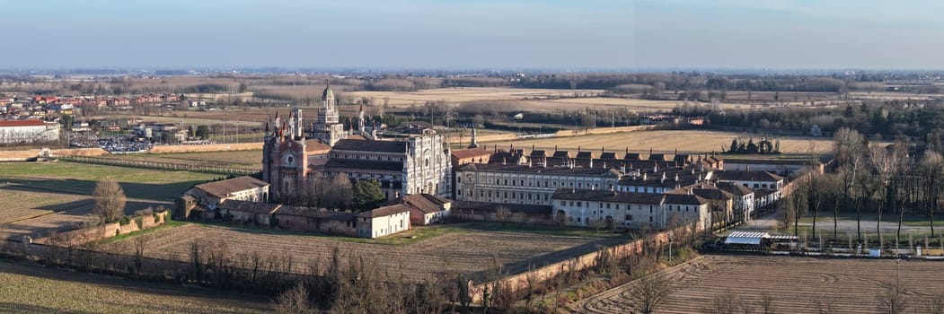 Drone shot of Certosa di Pavia cathedral a historical monumental complex that includes a monastery and a sanctuary. Pavia ,Italy.