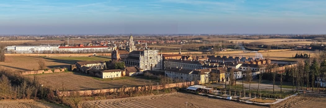 Drone shot of Certosa di Pavia cathedral a historical monumental complex that includes a monastery and a sanctuary. Pavia ,Italy.