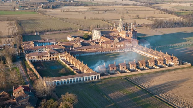 Drone shot of Certosa di Pavia cathedral a historical monumental complex that includes a monastery and a sanctuary. Pavia ,Italy.