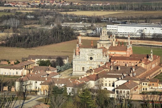 Drone shot of Certosa di Pavia cathedral a historical monumental complex that includes a monastery and a sanctuary. Pavia ,Italy.