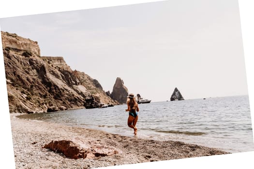 Woman beach vacation photo. A happy tourist in a blue bikini enjoying the scenic view of the sea and volcanic mountains while taking pictures to capture the memories of her travel adventure