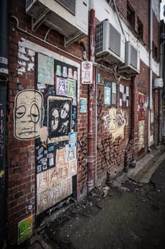 GEELONG, AUSTRALIA - JANUARY 26 2024: The laneways and artwork around Minns Lane near Little Malop St on a warm summer's morning in Geelong, Victoria, Australia