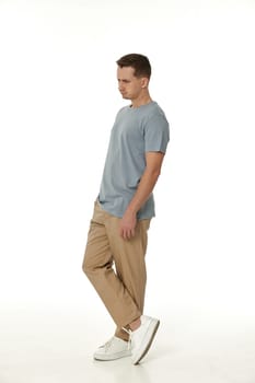 offended frustrated young man on white background. sadness