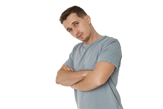 portrait of young calm man on white background