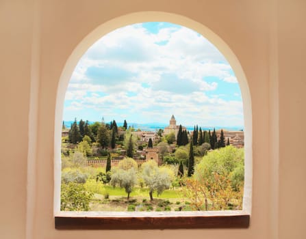 Alhambra, Granada, Andalusia, Spain. Palace and fortress complex. View through window.