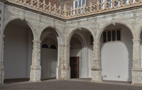 London, UK - Feb 15, 2024 - Exterior architecture of the remains Holland House (Red Brick Stone Palace) in Holland park. originally known as Cope Castle, was an early Jacobean House, Space for text, Selective focus.