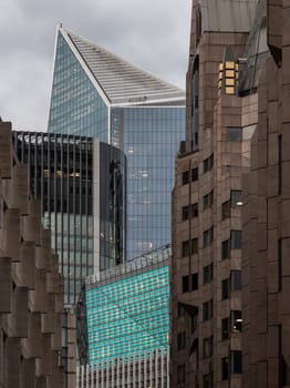 London, UK - Feb 15, 2024 - Architectural design of The Scalpel and Different building on Minching Lane in the City of London. Space for text, Selective focus.