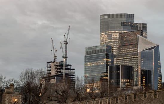London, UK - Feb 15, 2024 - View of skyscraper in the business district of London sunset. Architectural modern buildings of the city, Space for text, Selective Focus.