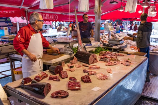 Catania, Italy - November 1, 2019: Seafood at fish market in Catania, Sicily, Italy. Fresh fish at the fish market in the old Town of Catania in the province of Sicily in Italy. 