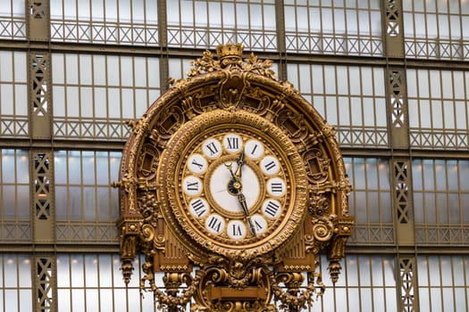 Paris, France - July 5, 2018: Visitors at the Musee d'Orsay in Paris. Located in the former Gare d'Orsay train station, the museum has the largest collection of impressionist paintings in the world.