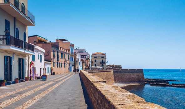 Alghero, Italy - July 21, 2019: Alghero old town, Alghero street view on a beautiful day. Alghero, Italy. Panoramic aerial view of Alghero, Sardinia, Italy. 