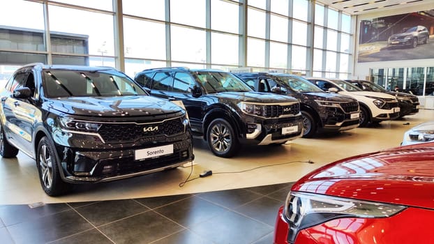 Kazan, Russia - April 04, 2023: Cars in showroom of dealership KIA. Re-export to Russia