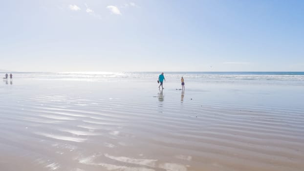 Pismo Beach is strikingly empty during a winter day, offering a serene and peaceful atmosphere with its expansive sandy shore and the soothing sounds of the waves.