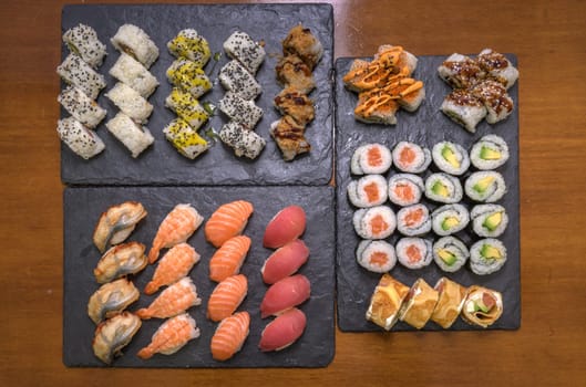 a plate with colorful assorted sush