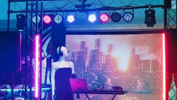 Empty partying stage with DJ panel used for live disco music at club on dance floor. Discotheque with spotlights and audio equipment station, nightclub and bar used for funky event.