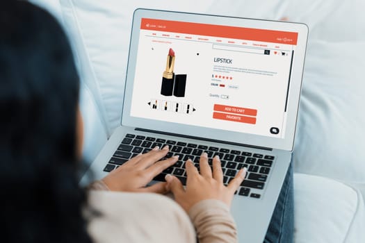 Woman shopping online on internet marketplace browsing for sale items for modern lifestyle and use credit card for online payment from wallet protected by crucial cyber security software