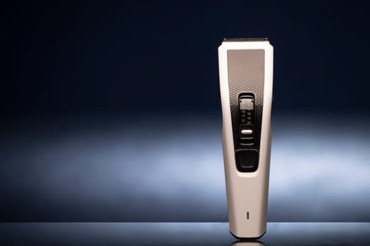 Electric razor for men on a blue background.