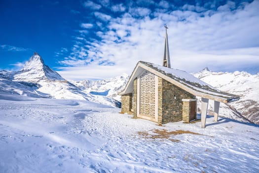 Riffelberg chapel under Matterhorn mountain peak scenic winter landscape view, ski area of Zermatt, Switzerland