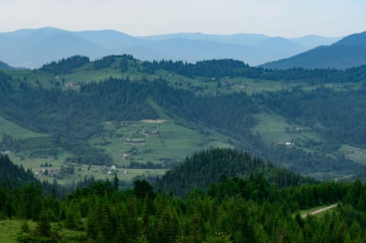 Picturesque views of the Carpathians and the village, wallpapers on the theme of mountains and the village, a journey through the mountains.