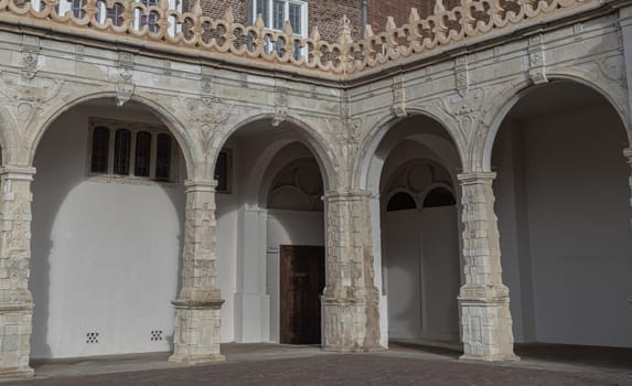 London, UK - Feb 15, 2024 - Exterior architecture of the remains Holland House (Red Brick Stone Palace) in Holland park. originally known as Cope Castle, was an early Jacobean House, Copy space, Selective focus.