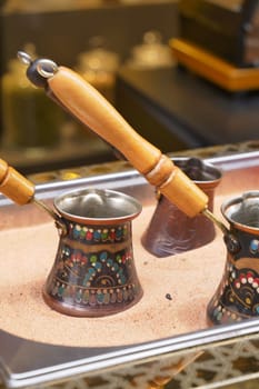 top view of making traditional turkish coffee on sand