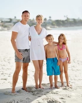 Parents, children and portrait on beach in summer for holiday on island or bonding, connection or vacation. Man, woman and siblings with face in Florida together or outdoor happiness, travel or relax.
