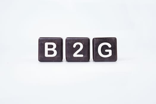 The word B2G on cubes on a white background. Business to government header