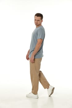 offended frustrated young man on white background. sadness