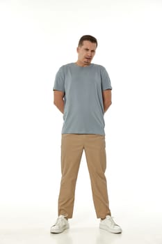 offended frustrated young man on white background. sadness