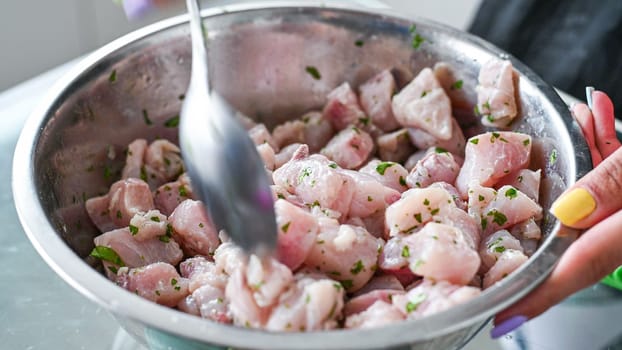 Peruvian food ceviche. 3 Preparation of ceviche, stirring the seasonings with the coriander
