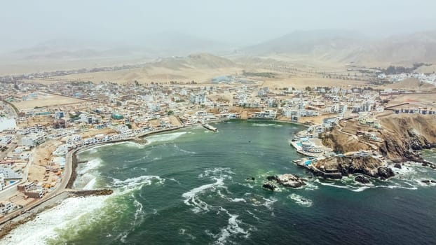 Aerial view with drone of the district of San Bartolo next to the sea