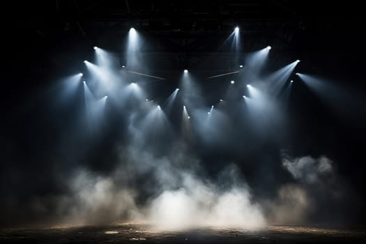 Empty space in the bright rays of spotlights and puffs of smoke.
