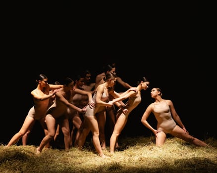 Group of modern ballet dancers. Contemporary art. Young flexible athletic men and women. Concept of dance grace, inspiration, creativity. Group of 11 models.